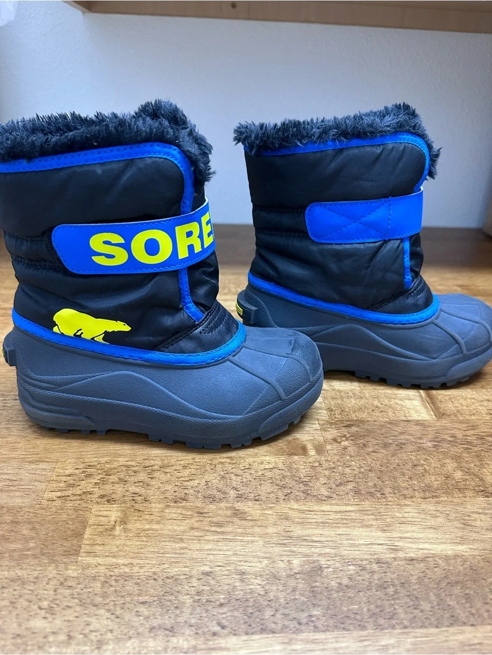 Sorel Kids Black and Blue Winter Boots with Yellow Logo